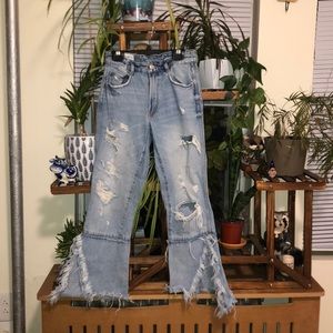 Frayed denim with slits